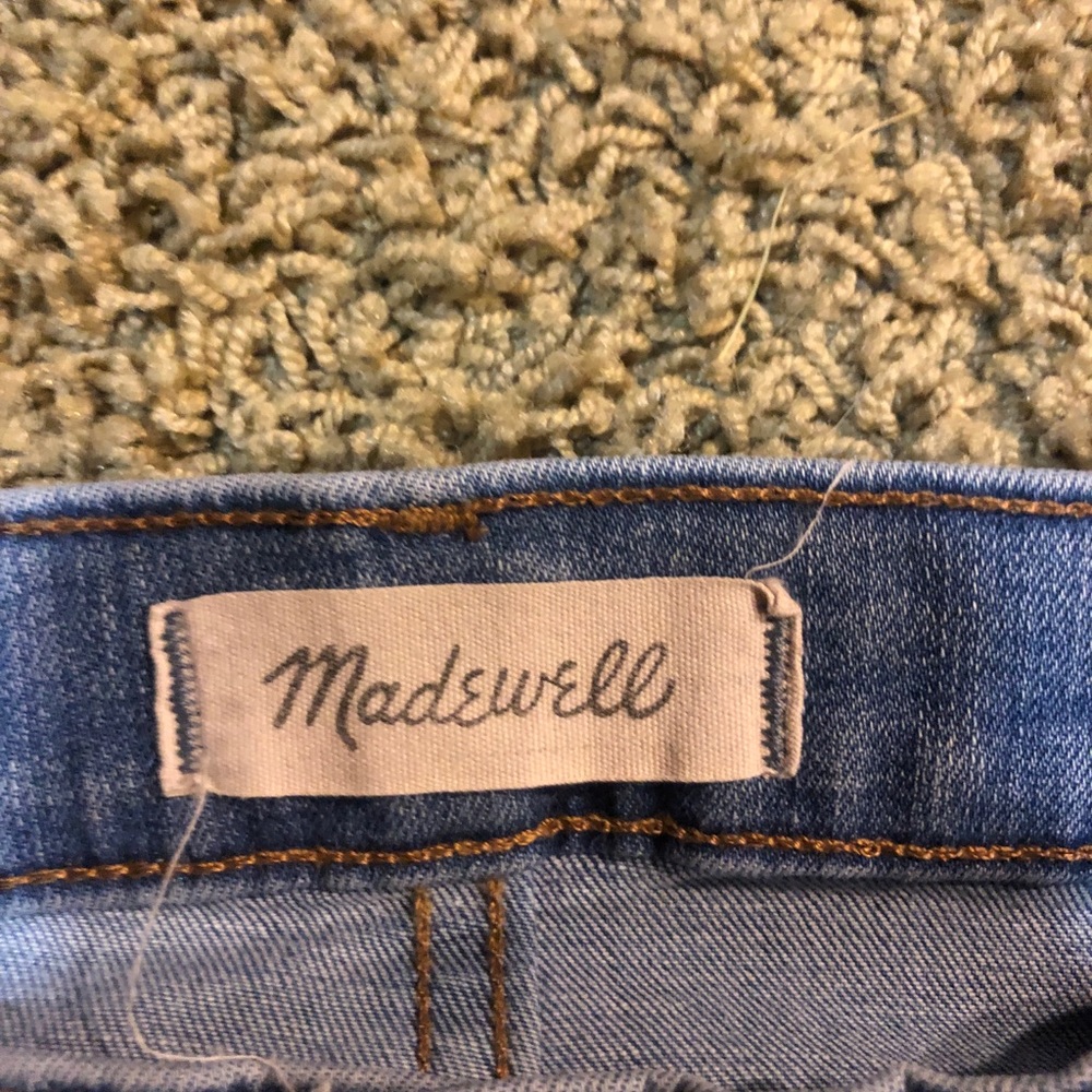 Madewell jeans with distressed rips